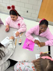 student playing math dice