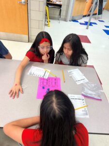 student playing math dice