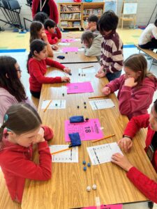 student playing math dice