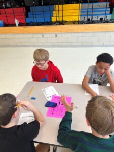 student playing math dice