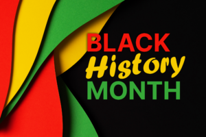 Black History Month in yellow, green, and red writing with a black background