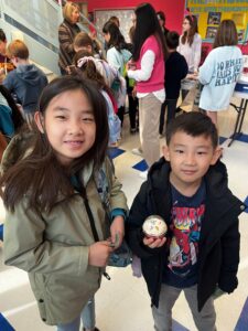 Students at the Glebe SCA Bake Sale with their treats