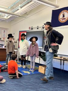 Students participating in a Civil War discussion with a presenter