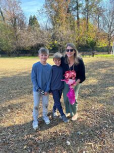 Lindsay Estabrooks with 2 students after receiving Glebe Teacher of the year